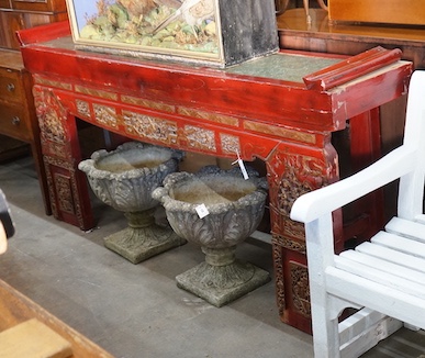 A Chinese carved scarlet and gilt painted altar table with faux stone top, length 198cm, depth 41cm, height 98cm